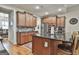Kitchen offers granite countertops, breakfast bar, and plenty of storage at 500 Cottonwood Cir, Peachtree City, GA 30269