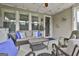 Inviting covered patio with stylish seating and a view of the backyard at 500 Cottonwood Cir, Peachtree City, GA 30269
