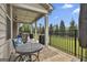 Cozy outdoor patio with comfortable seating, ideal for relaxing and entertaining guests at 500 Cottonwood Cir, Peachtree City, GA 30269