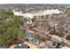 Aerial view of a lakeside community showcasing large homes and mature trees at 600 Lake Overlook Dr, Canton, GA 30114