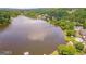 Lush aerial view of a lake community featuring waterfront homes and mature trees at 600 Lake Overlook Dr, Canton, GA 30114