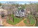 Aerial view of the home showcasing a charming porch and manicured landscaping at 600 Lake Overlook Dr, Canton, GA 30114