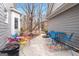 Charming backyard with colorful outdoor seating and a grill at 600 Lake Overlook Dr, Canton, GA 30114