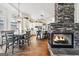 Open concept living room and kitchen with stone fireplace, perfect for entertaining at 600 Lake Overlook Dr, Canton, GA 30114