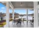 Relaxing porch view overlooking a serene lake, perfect for enjoying the outdoors at 600 Lake Overlook Dr, Canton, GA 30114