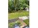An open backyard with a partial view of the home at 3132 Riders Trl, Decatur, GA 30034