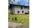 A backyard with brick and green grass at 3132 Riders Trl, Decatur, GA 30034