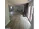 Spacious basement with new flooring, freshly painted walls, a fireplace, and a walkout to the backyard at 3132 Riders Trl, Decatur, GA 30034