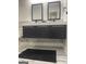Modern bathroom featuring a double sink vanity with marble countertops at 3132 Riders Trl, Decatur, GA 30034