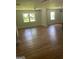 Large open living space with hardwood floors, and great natural light at 3132 Riders Trl, Decatur, GA 30034