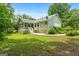 Well-maintained home with a spacious backyard, screened-in porch and inviting outdoor living space at 41 Ridgewood Cir, Mcdonough, GA 30252