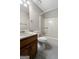 Functional bathroom featuring a single sink vanity, toilet, and a tub/shower combination at 41 Ridgewood Cir, Mcdonough, GA 30252