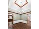 Dining room with decorative molding, unique ceiling detail, and wood look floors at 41 Ridgewood Cir, Mcdonough, GA 30252
