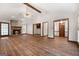 Bright living room with vaulted ceiling, stone fireplace, and access to other rooms at 41 Ridgewood Cir, Mcdonough, GA 30252