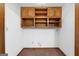 Storage room with built in shelves and carpet flooring at 41 Ridgewood Cir, Mcdonough, GA 30252