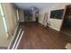 Spacious living room featuring a classic fireplace and hardwood floors at 4060 Sumit Wood Nw Dr, Kennesaw, GA 30152