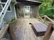 Back porch with a full covering for shade on a sunny day at 4060 Sumit Wood Nw Dr, Kennesaw, GA 30152