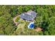 Aerial view of back of house with large yard and pool at 130 Allie Drive, Mcdonough, GA 30252