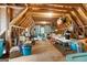 Unfinished attic space offers potential for customization and ample storage under exposed wood beams at 130 Allie Drive, Mcdonough, GA 30252