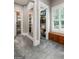 Spacious walk-in closet with shelves, seating, a full-length mirror, providing ample storage at 130 Allie Drive, Mcdonough, GA 30252