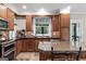 Elegant kitchen with custom cabinetry, stainless steel appliances, and a view to the backyard at 130 Allie Drive, Mcdonough, GA 30252