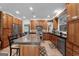 Open kitchen with granite countertops, stainless steel appliances, and central island at 130 Allie Drive, Mcdonough, GA 30252