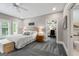 Lovely main bedroom with soft carpeting and view to a study and a bathroom at 130 Allie Drive, Mcdonough, GA 30252