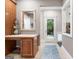 Mud room with a work area and desk with tiled floors and an exterior door at 130 Allie Drive, Mcdonough, GA 30252