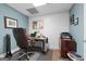 Functional home office space, with hardwood floors and featuring a large work desk and ample room for storage at 130 Allie Drive, Mcdonough, GA 30252