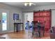 Basement featuring a table and chairs, sliding barn door, and access to a home gym at 405 Highgrove Dr, Fayetteville, GA 30215