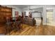 Basement area with bar table and chairs, movie screen, and comfortable seating with a wet bar at 405 Highgrove Dr, Fayetteville, GA 30215