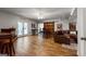 Spacious living room featuring a bar area, barn door, and a comfortable seating arrangement at 405 Highgrove Dr, Fayetteville, GA 30215