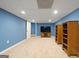 Finished basement with neutral carpet and ample space for entertainment at 212 Warrenton Dr, Douglasville, GA 30134