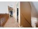 Upstairs hallway featuring access to the bedrooms and bathrooms at 212 Warrenton Dr, Douglasville, GA 30134