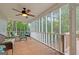 Relaxing screened porch with wooded views and comfortable seating at 212 Warrenton Dr, Douglasville, GA 30134