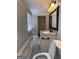 Bathroom featuring tiled floors and a single vanity sink at 1055 Worthington Hills Dr, Roswell, GA 30076