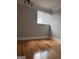 Bedroom space with hardwood floors and natural light at 1055 Worthington Hills Dr, Roswell, GA 30076