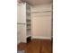 Walk-in closet with custom shelving for organized storage at 1055 Worthington Hills Dr, Roswell, GA 30076