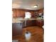 Well-appointed kitchen featuring wood cabinets, granite countertops, and stainless steel appliances at 1055 Worthington Hills Dr, Roswell, GA 30076
