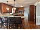 Spacious kitchen with wood cabinets, granite countertops, stainless steel appliances, and hardwood floors at 1055 Worthington Hills Dr, Roswell, GA 30076