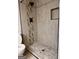 Shower showcasing decorative tile accents and modern fixtures at 1055 Worthington Hills Dr, Roswell, GA 30076