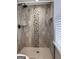 Tile shower featuring updated fixture and design at 1055 Worthington Hills Dr, Roswell, GA 30076