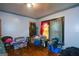 Bedroom with hardwood floors, neutral walls and closet, providing functionality and style at 1660 Rogers Sw Ave, Atlanta, GA 30310