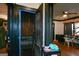 The living room features hardwood floors, ceiling fan, and access to the basement at 1660 Rogers Sw Ave, Atlanta, GA 30310