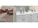 Bathroom with a dual sink vanity and view to the main bedroom at 175 N Unity Grove Rd, Locust Grove, GA 30248