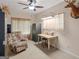 A unique bedroom featuring an accent wall, overhead lighting, and camouflage chair at 175 N Unity Grove Rd, Locust Grove, GA 30248