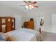 Comfortable bedroom features natural light and decor with wooden furniture at 175 N Unity Grove Rd, Locust Grove, GA 30248