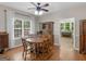 Dining room featuring hardwood floors, natural light, and classic wooden furniture at 175 N Unity Grove Rd, Locust Grove, GA 30248