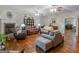 Spacious living room with wood floors, fireplace and comfortable seating area at 175 N Unity Grove Rd, Locust Grove, GA 30248
