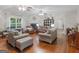 Spacious living room features hardwood floors, fireplace, and natural light at 175 N Unity Grove Rd, Locust Grove, GA 30248